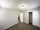 Bedroom featuring carpet, neutral walls, closet, ceiling light and white trim at 2566 Nw Santa Barbara Dr, Atlanta, GA 30318