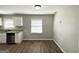 Bright kitchen with modern appliances, granite countertops, and ample cabinet space at 2566 Nw Santa Barbara Dr, Atlanta, GA 30318