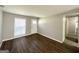 Inviting living room boasts updated floors, neutral colors, and abundant natural light at 2566 Nw Santa Barbara Dr, Atlanta, GA 30318
