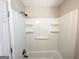 Clean, white shower and tub combination at 3566 Fairlane Nw Dr, Atlanta, GA 30331