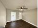 Bright bedroom with hardwood floors, a window, and neutral paint color at 3566 Fairlane Nw Dr, Atlanta, GA 30331