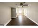 Spacious living room with hardwood floors and neutral paint, open to dining area at 3566 Fairlane Nw Dr, Atlanta, GA 30331