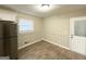 Bright dining area with wood-look floors and a white door at 518 Hammett Dr, Decatur, GA 30032