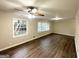 Spacious living room with hardwood floors and lots of natural light at 518 Hammett Dr, Decatur, GA 30032
