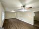 Large living room with hardwood floors and a ceiling fan at 518 Hammett Dr, Decatur, GA 30032
