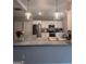 Beautiful kitchen with a granite countertop, stainless steel appliances, and pendant lighting at 7703 Fawn Cir, Covington, GA 30014