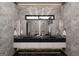 Elegant bathroom featuring dual sink vanity with modern mirrors and sleek fixtures at 2704 Antioch Ne St, Conyers, GA 30013