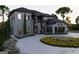 Beautiful two-story home with gray brick exterior and modern landscaping at 2704 Antioch Ne St, Conyers, GA 30013