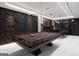 Entertaining game room with a pool table, bar area, and stylish modern accents at 2704 Antioch Ne St, Conyers, GA 30013
