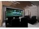 Immersive home theater with comfortable seating and a large screen, perfect for movie nights at 2704 Antioch Ne St, Conyers, GA 30013