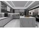 Bright modern kitchen featuring a waterfall island, stainless steel appliances, and grey cabinets at 2704 Antioch Ne St, Conyers, GA 30013