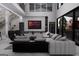 Modern living room featuring high ceilings, a fireplace, and an entertainment center at 2704 Antioch Ne St, Conyers, GA 30013