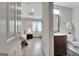 Bedroom and partial bathroom view shows contemporary space with sleek fixtures at 4 & 5 Northlake Cir, Peachtree City, GA 30269