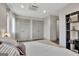 This bedroom features gray wood floors and plenty of closet space at 4 & 5 Northlake Cir, Peachtree City, GA 30269