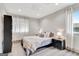 This bedroom boasts stylish wood floors, natural light and neutral decor at 4 & 5 Northlake Cir, Peachtree City, GA 30269