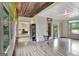 Elegant dining area with wood ceiling and glass door to the outside at 4 & 5 Northlake Cir, Peachtree City, GA 30269