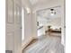 Hallway view leads to a bright living space with lots of natural light at 4 & 5 Northlake Cir, Peachtree City, GA 30269