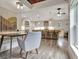 Elegant kitchen featuring pendant lighting, island with seating, and stainless appliances at 4 & 5 Northlake Cir, Peachtree City, GA 30269