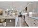 Spacious kitchen with granite countertops, stainless steel appliances, and an island with seating at 4 & 5 Northlake Cir, Peachtree City, GA 30269