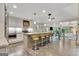 Open kitchen with a large island, stainless steel appliances, and view to living area at 4 & 5 Northlake Cir, Peachtree City, GA 30269