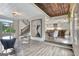 Bright living room featuring hardwood floors and an open floorplan to kitchen at 4 & 5 Northlake Cir, Peachtree City, GA 30269