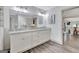Bright bathroom with dual sinks, granite countertops, and modern fixtures, offering a spa-like experience at 4 & 5 Northlake Cir, Peachtree City, GA 30269