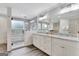 Luxurious main bathroom features a walk-in shower, granite countertops, and ample cabinet space at 4 & 5 Northlake Cir, Peachtree City, GA 30269