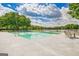 Large pool and patio area provides a great outdoor space to relax and enjoy the lake view at 4 & 5 Northlake Cir, Peachtree City, GA 30269