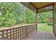 A cozy porch offering great views of the backyard and the surrounding green landscape at 4 & 5 Northlake Cir, Peachtree City, GA 30269