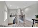 Second floor landing with staircase featuring wood and iron railings and an art piece at 4 & 5 Northlake Cir, Peachtree City, GA 30269