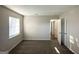 Neutral bedroom showcasing two closets and carpet flooring at 2017 Lindsey Ln, Decatur, GA 30035