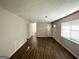 Spacious open-concept living area with hardwood floors and plenty of natural light at 2017 Lindsey Ln, Decatur, GA 30035