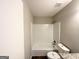 Bathroom featuring a tiled shower/tub combination and granite countertop at 2317 Emerald Springs Dr, Decatur, GA 30035