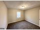Neutral bedroom with carpet flooring, a window with blinds and a ceiling light at 2317 Emerald Springs Dr, Decatur, GA 30035