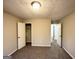 Standard bedroom featuring carpet flooring and two closet spaces for ample storage at 2317 Emerald Springs Dr, Decatur, GA 30035