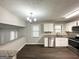 Modern kitchen with stainless steel appliances, granite countertops, and lots of natural light at 2317 Emerald Springs Dr, Decatur, GA 30035