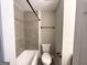 Updated bathroom with tiled shower and modern fixtures, offering a clean and stylish space at 2676 Stone Rd, East Point, GA 30344