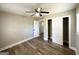 Bedroom with wood-look flooring, closet and access to the bathroom at 2676 Stone Rd, East Point, GA 30344