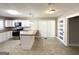 Modern kitchen featuring stainless steel appliances and a kitchen island with butcher block countertops at 2676 Stone Rd, East Point, GA 30344