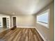 Bright and airy living room featuring hardwood floors and large windows with natural light at 2676 Stone Rd, East Point, GA 30344