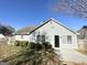 Charming one-story home with gray siding and well-maintained landscaping at 315 Breezy Hill Walk, Stockbridge, GA 30281