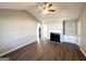 Spacious living room featuring hardwood floors, fireplace, and vaulted ceilings at 315 Breezy Hill Walk, Stockbridge, GA 30281