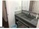 Bathroom featuring a vanity with modern fixtures and additional storage at 3834 Kensingwood Trce, Decatur, GA 30032