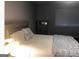 Bedroom with neutral walls, a cozy bed, a dresser, and natural light from a window at 3834 Kensingwood Trce, Decatur, GA 30032