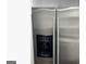 Stainless steel refrigerator featuring a water and ice dispenser, offering modern convenience at 3834 Kensingwood Trce, Decatur, GA 30032