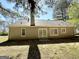 View of the rear of the house and backyard at 710 Thomasville Se Blvd, Atlanta, GA 30315