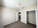 Comfortable bedroom featuring plush carpet and neutral walls with a closet for storage and organization at 710 Thomasville Se Blvd, Atlanta, GA 30315