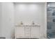 Bathroom featuring a double vanity with marble countertop and gold fixtures at 1101 Oak Knoll Ter, Atlanta, GA 30315