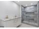 Bathroom featuring white double vanity and walk-in shower at 1101 Oak Knoll Ter, Atlanta, GA 30315