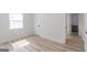 Bright bedroom with neutral walls and wood-look flooring at 1101 Oak Knoll Ter, Atlanta, GA 30315